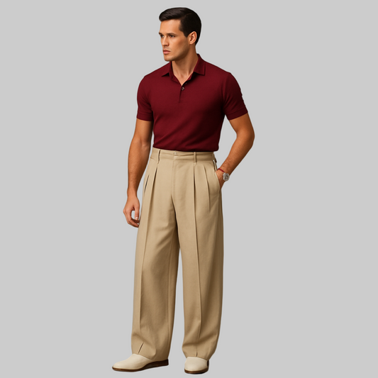 FULL IMAGE OF MALE MODEL WEARING BEIGE COLOUR  DOUBLE PLEATED LOOSE  EVERY EXTRA WIDE LEGS. KOREAN TROUSER WITH CROSS POCKETS AT FRONT ,BELT LOOPS . MODEL IS 6.4 INCHES TALL  WITH MAFIA LIKE HAIR STYLE AND WEARING  FITTED WINE  COLOUR HALF SHIRT AND WRIST WATCH WITH CREAM SHOES .